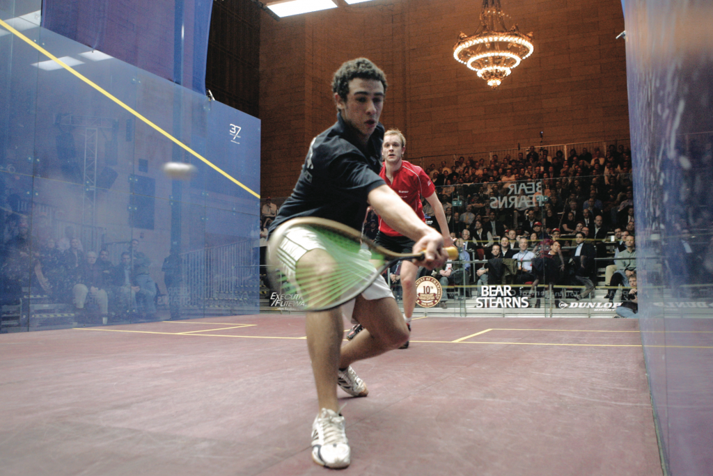Where did it go? With what is rapidly becoming a Ramy Ashour trademark—the front court cross-court flick from virtually any angle, regardless of how close to the front wall—James Willstrop is left to scramble to the opposite corner before the ball dies in the nick.