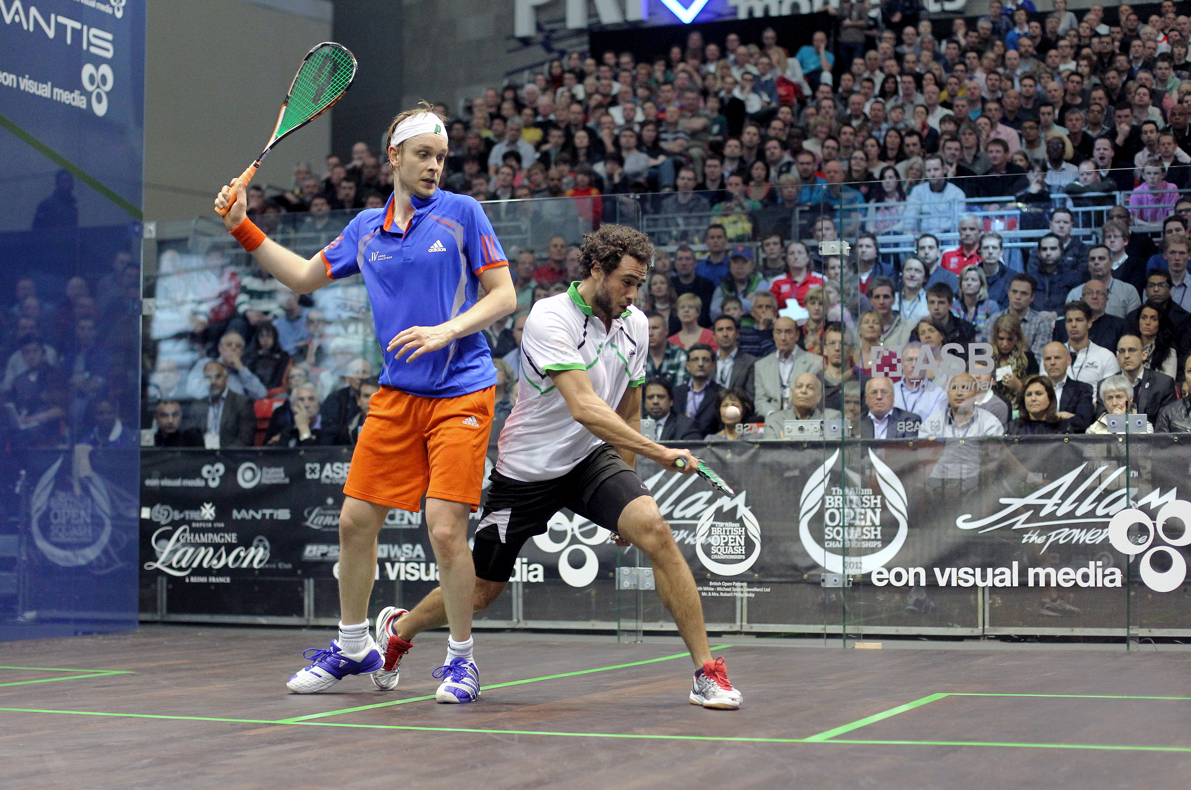 The nature of squash is such that players cannot—and do not—insist on perfect freedom to play the ball. The compromise of playing balls despite some interference lends to the flow of the game.