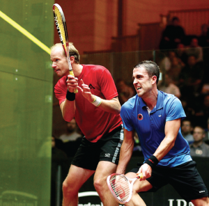 The most shocking result of the week came in the Men's first round when South Africa's Stephen Coppinger (L) upset the fifth-seeded Englishman, Peter Barker, in four games. Barker was hampered by an injury in the fourth game, but Coppinger went on to upset Adrian Grant in the next round as well, needing five games to advance. 