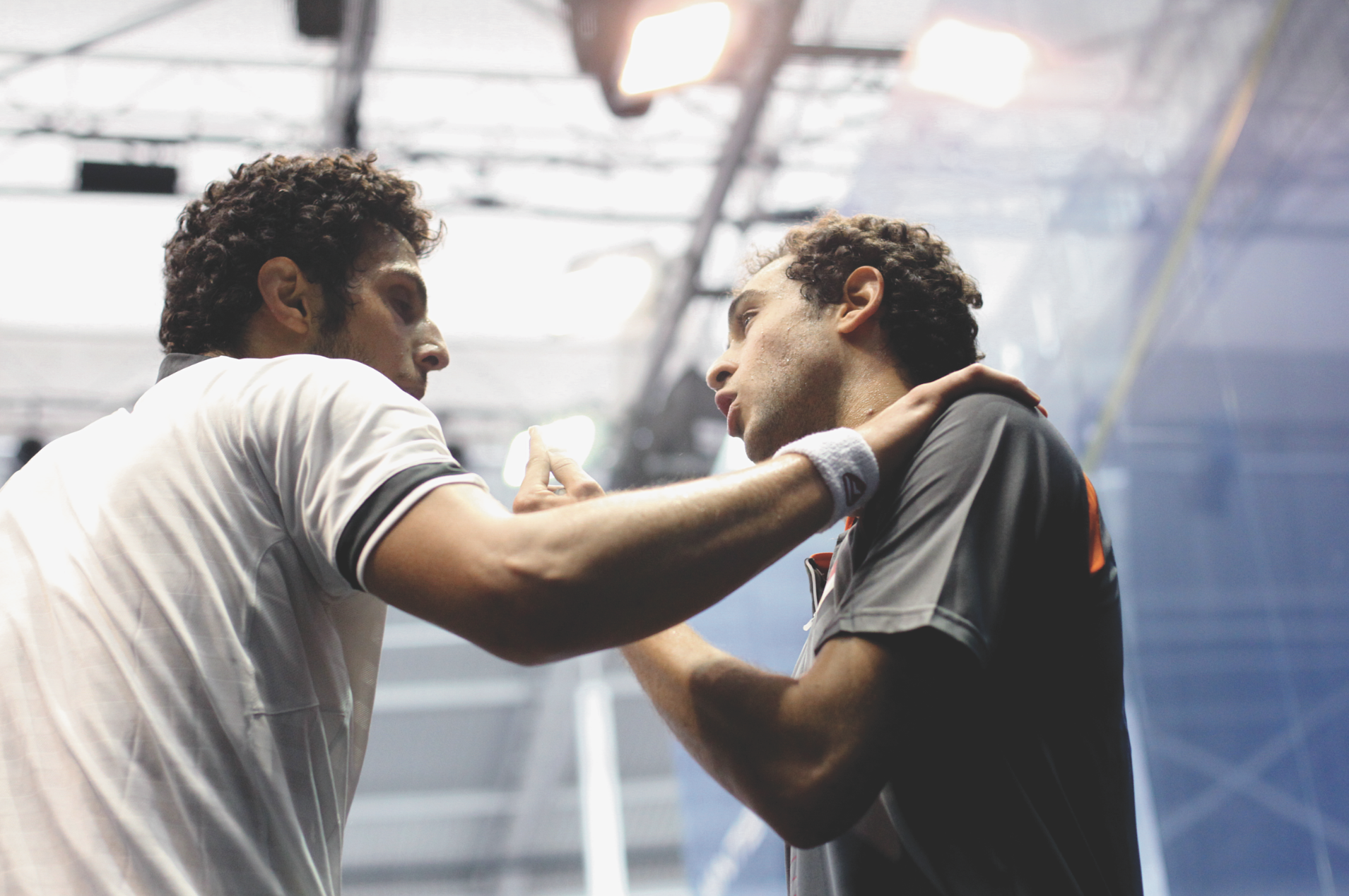 In a highly contentious opening round match, Egyptians Omar Mosaad (In white) and Ramy Ashour squared off for the 16th time since 2006, with the same result—an Ashour victory. 