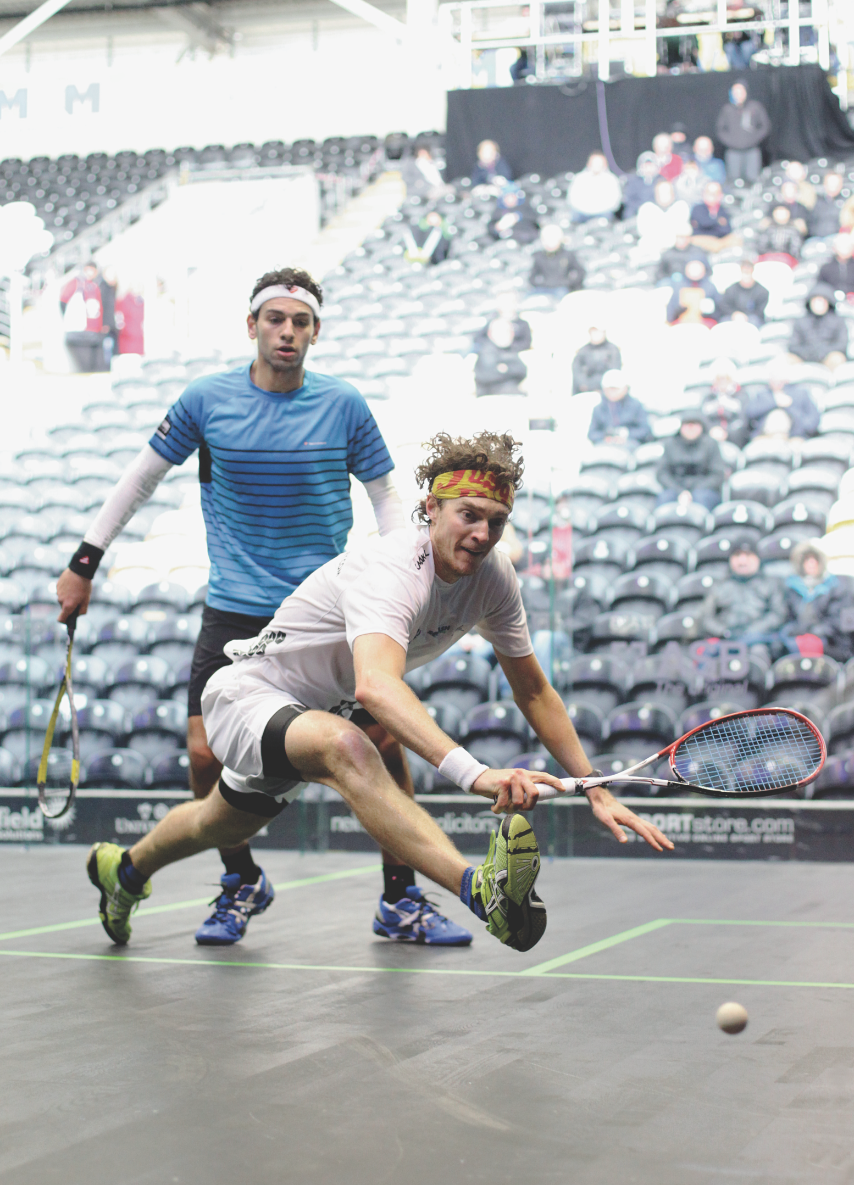 Australian Cameron Pilley (In white) caused the most “turmoil” in the draw when he recovered from 9-3 down in the second to Mohamed El Shorbagy (L), ran the table to take the game, and ultimately the match to advance to the quarters.