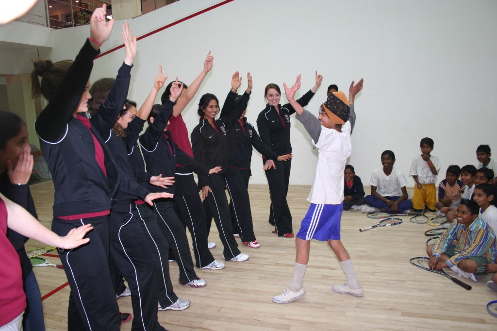 Manjeet, a student at Khelshala, teaches the Harvard Women’s team to dance. 