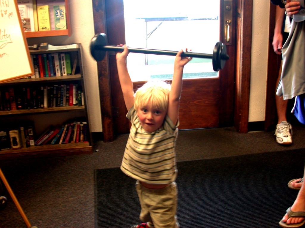 NEVER TOO EARLY Three-and-a-half-year-old Ollie Leedale-Brown shows good form with his own weightlifting routine.