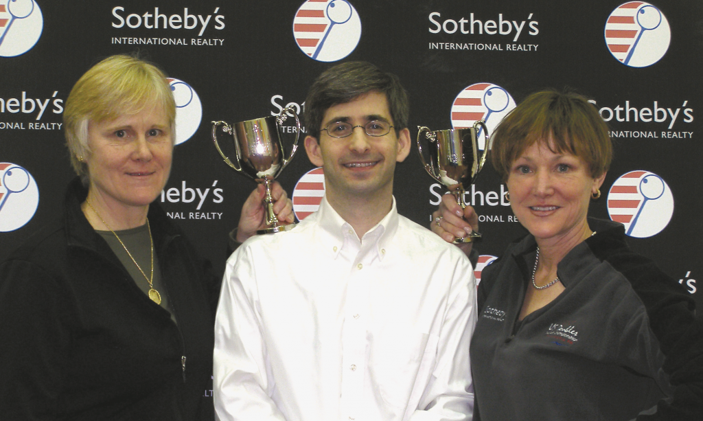 US Squash CEO Kevin Klipstein (top) flanked by Women’s 50+ winners Sandy Shaw (L) and Lolly Gillen.