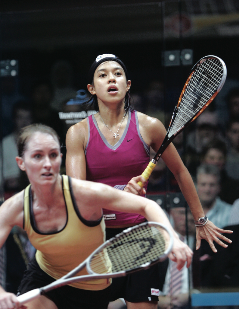 pressure packed Nicol David (top), the overwhelming favorite going into the World Open, recovered from being down 2-1 to Natalie Grinham to become just the fourth player to defend her title.