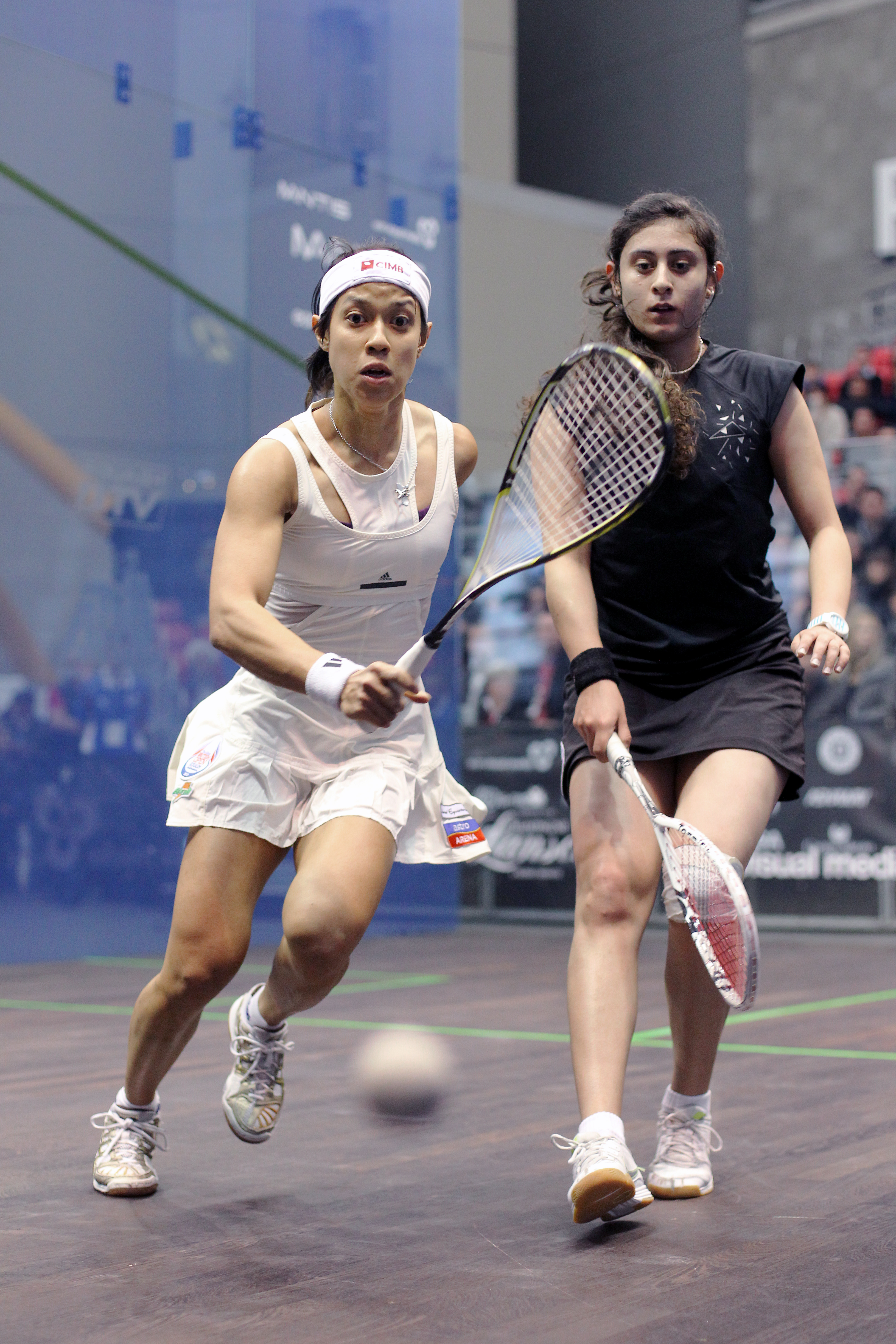 On the ladies side, the 16th seeded Sherbini (R) knocked off Joey Chan, No. 4 seed Madeline Perry and No. 7 seed Annie Au in five games each but ultimately fell just short of winning the title as Nicol David (L) claimed her first title in three games.