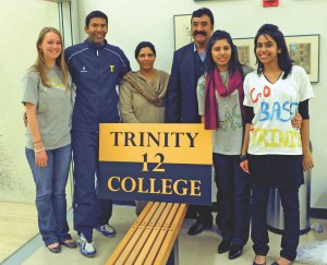 With the support of his girlfriend (pictured to Chaudhry’s right), Chelsea Hanse, and his parents and sisters who had flown in to see him play for the first time in his college career, Chaudhry began the process of owning the outcome of his match with Yale’s Kenneth Chan (opposite, right).