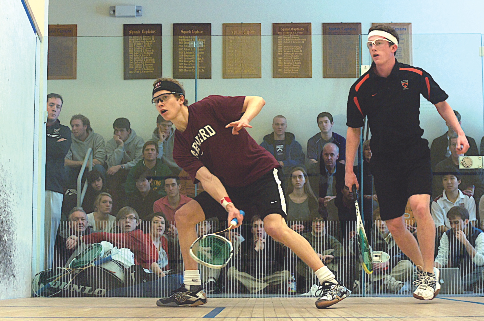 Harvard’s men were led all season by No. 1 Colin West (right), but his was the only win for the Crimson against Princeton in the team quarterfinals (over freshman Todd Harrity). Kenyon College captured the Chaffee Division and got things rolling in the quarterfinals by beating Boston College 7-2. Kenyon’s Danilo Lobo Diaz beat BC’s Philipe Katz (opposite, left) 3-0 and then came through in a clutch performance in the finals over California. Hosts Yale narrowly defeated Rochester in the Potter semifinals, including No. 9 Chris Plimpton (opposite, right in white shirt) overcoming the loss of the first game to Juan Pablo Gaviria on his way to winning, 3-1. Yale’s depth carried the day for the Bulldogs as each of the No. 7-9 positions won.