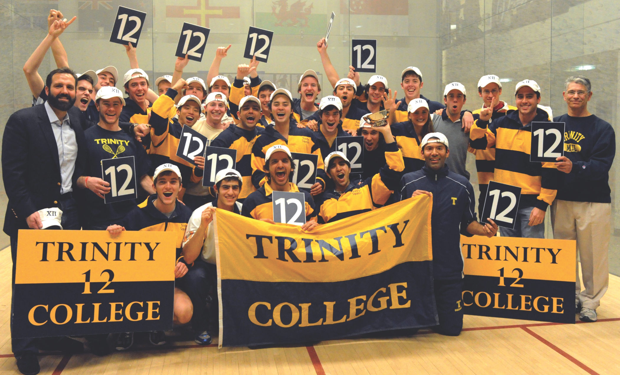 On the men’s side, the Trinity Bantams (Above) captured their 12th consecutive men’s championship by stopping host Yale, 6-3, on finals Sunday. The win extended Trinity’s unbeaten match string to 224.