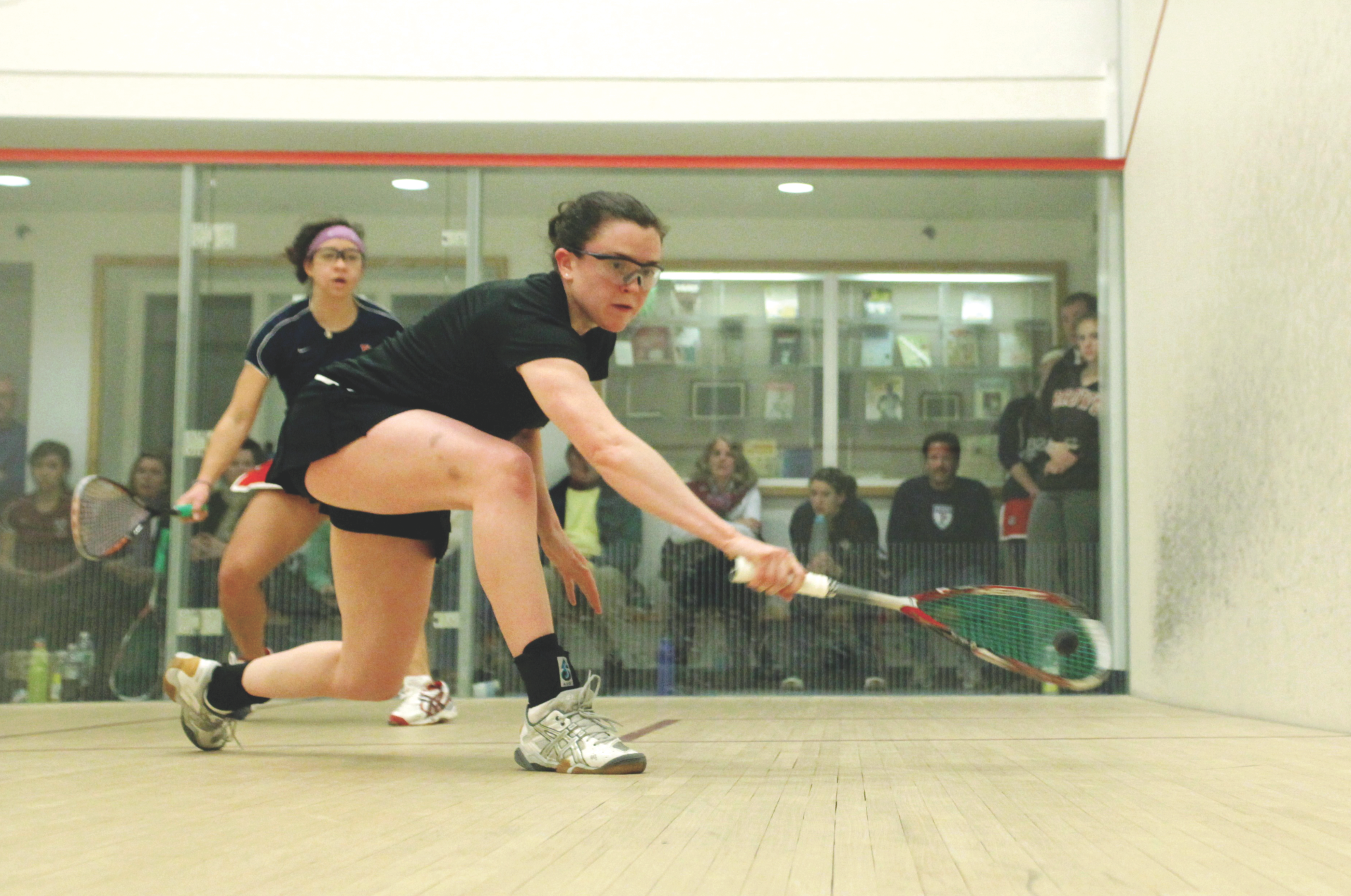 In the Howe Cup championship match featuring Harvard and Penn, Harvard’s Katherine O’Donnell (Opposite) jumped to an early two game lead over Penn’s Christina Matthias at the No. 8 position and then survived a torrid comeback by Matthias to clinch Harvard’s first Howe Cup since 2001. 