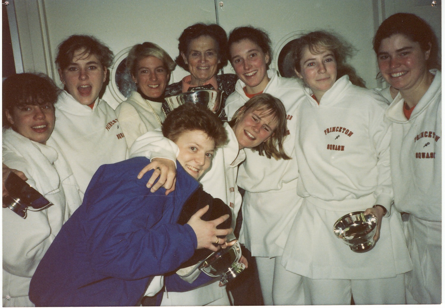 (L-R): In 1989, Princeton again won the Howe Cup, for the 11th time. On that team were Jen P. Roos (‘92), Mary Belknap (‘92), Ann Clark (‘80, Asst. Coach), Mary Foulk (‘91), Constable, Ann Sawyer (‘89), Hope MacKay (‘92), Elizabeth Van Orman (‘92), and Demer Holleran (‘89).
