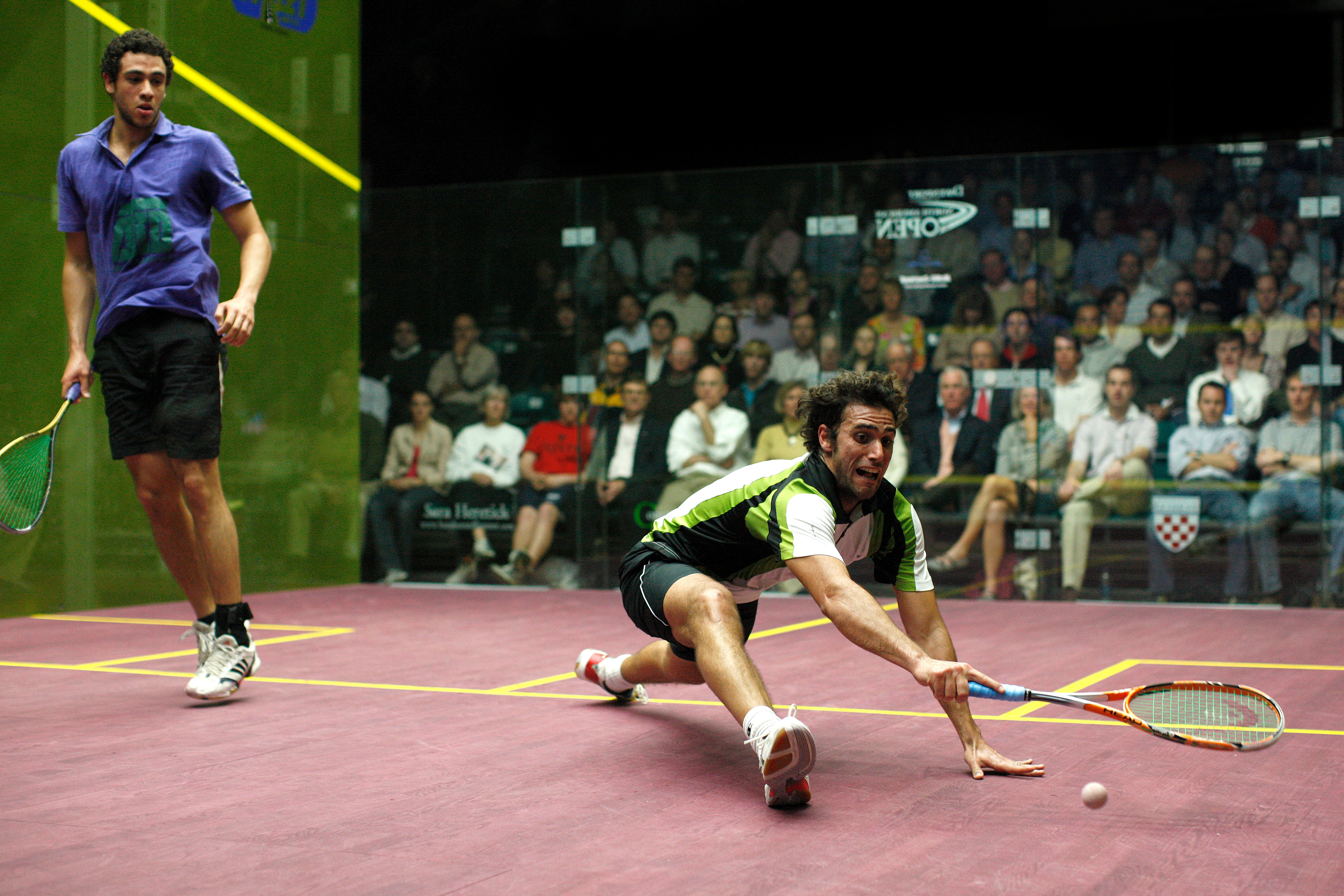Last year, Karim Darwish (R) beat the top-seeded Ramy Ashour in a five-game quarterfinal, but this year Ashour turned the tables by beating Darwish (seeded No. 1) in a five-game semifinal. In the finals