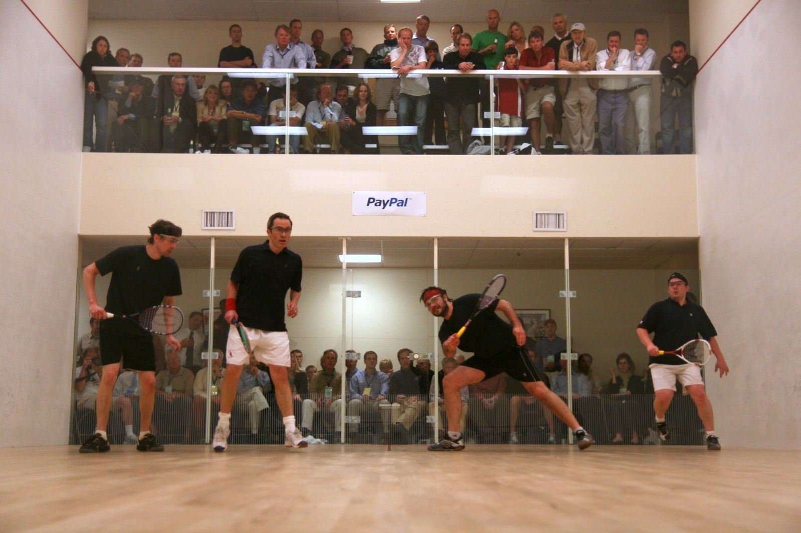 (L-R) Surprise men’s finalists Clive Leach and John Russell (white shorts) fell to the top-seeded Ben Gould and Paul Price.