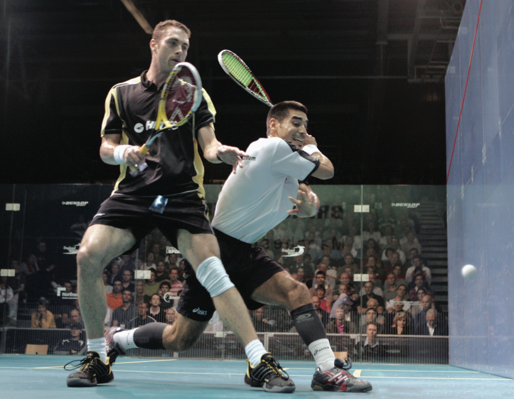 BACK BREAKER After suffering a back injury in a quarterfinal fall, Australian David Palmer (L) sustained a gluteal strain in his four-game semifinal loss to Thierry Lincou.