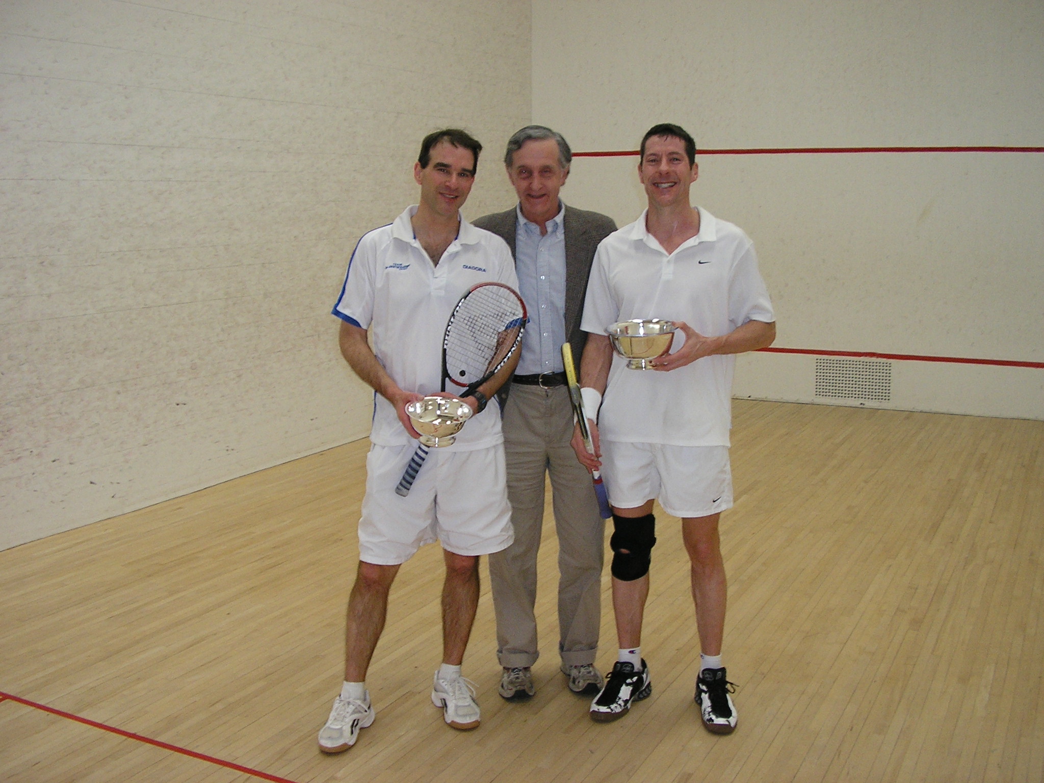 In the M40 final, Tim Kent was presented with the runners-up trophy by Roger Wales, and the winner was Tom Harrity