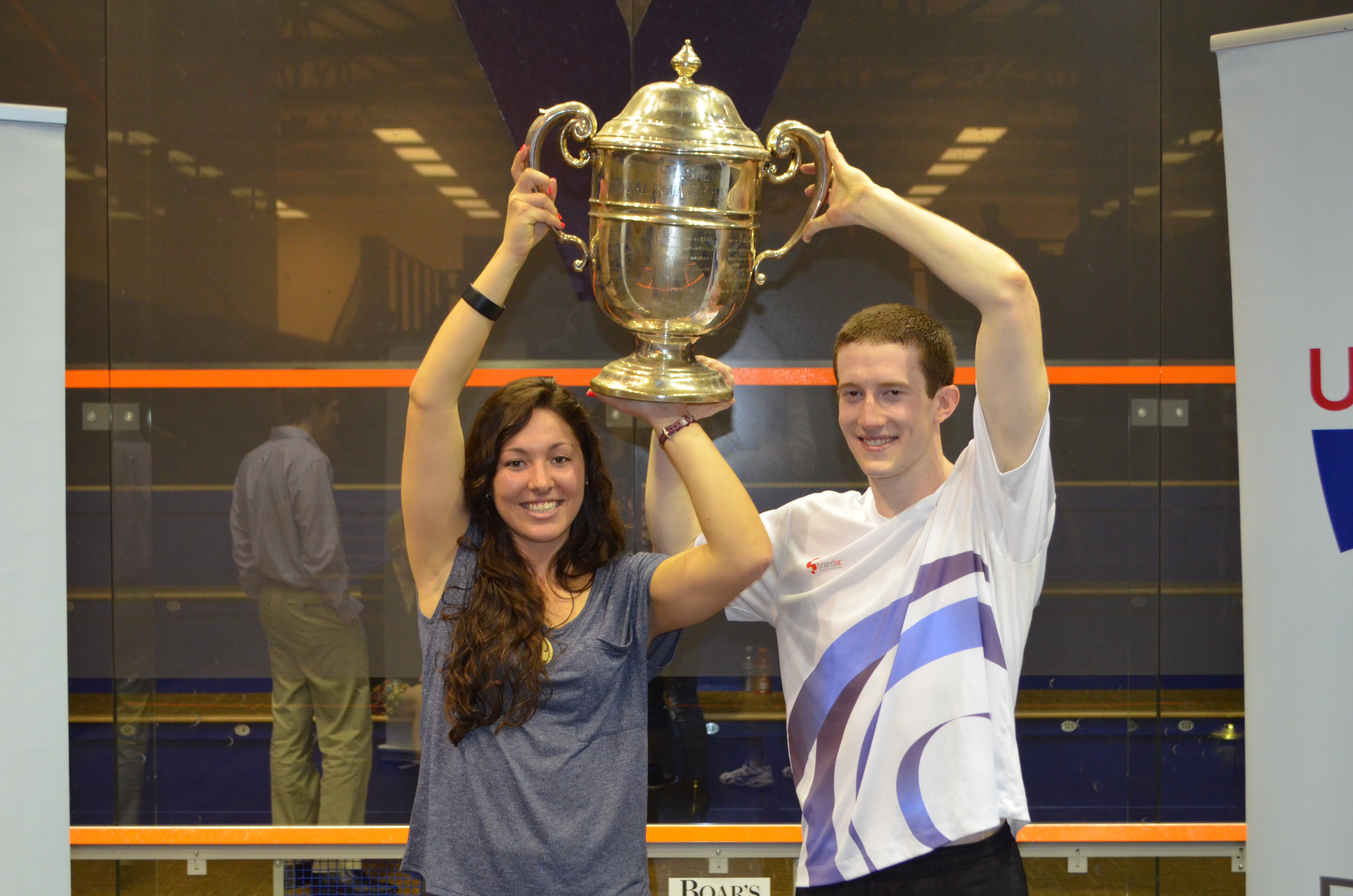 amanda and todd both hold SLG trophy