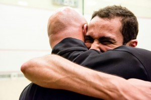 An emotional Ahmed Abdel Khalek celebrated his first individual title (and first for Bates) with coach Pat Cosquer (Image: MT Bello/mtbello.com) 