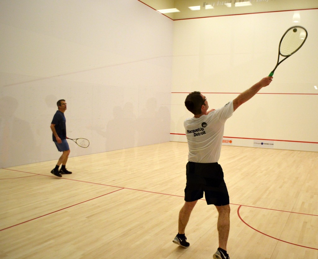 SquashBusters and RacquetUp Detroit Executive Directors Greg Zaff (left) and Derek Aquirre jump on the MetroSquash doubles court for some quality assurance. 