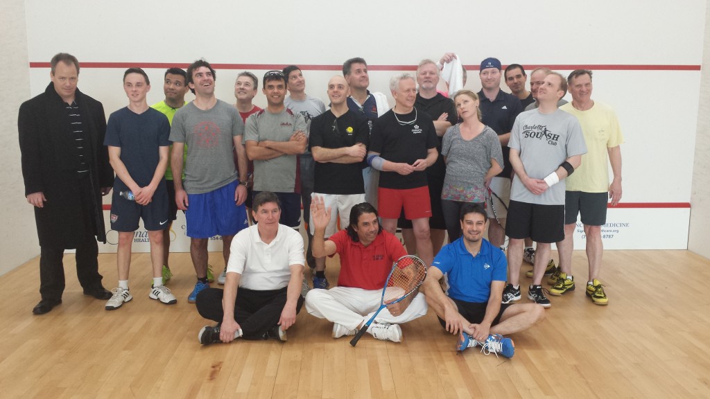 Participants in the Charlotte Squash Club's first adult tournament hopped on court for a group picture  
